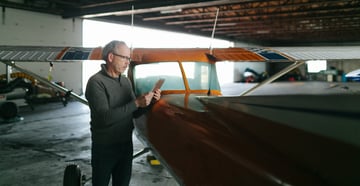 Pilot looking at the weather pre-flight