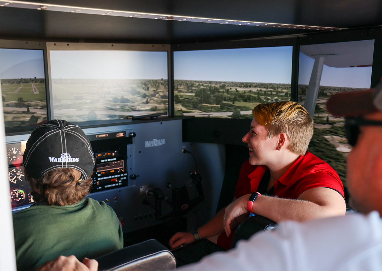 Student and instructor in a Redbird MCX