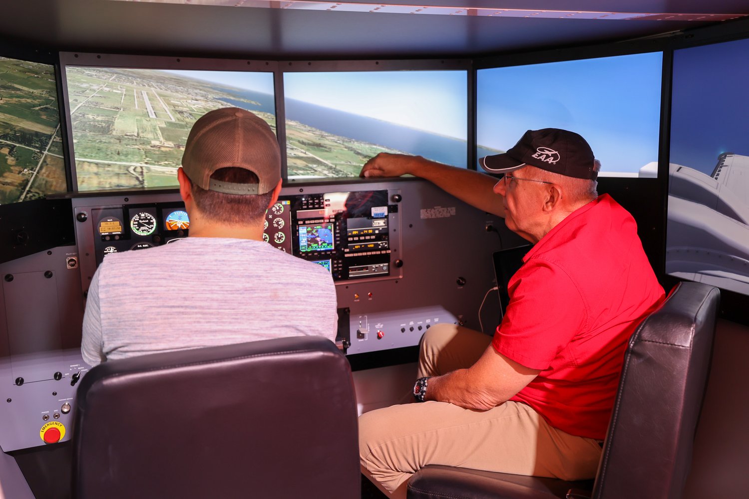 Instructor teaching in a flight simulator
