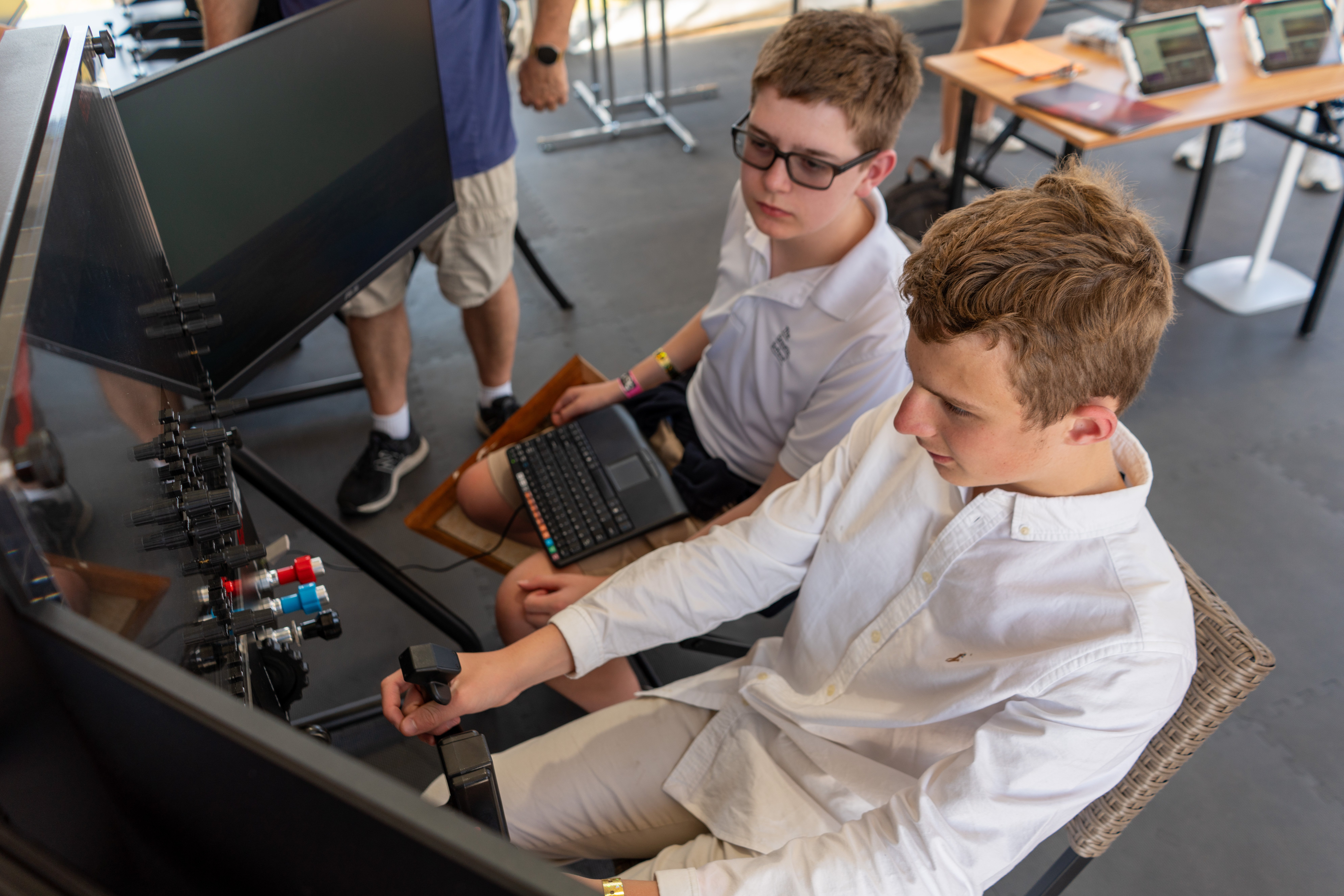 Students flying a Redbird TD2