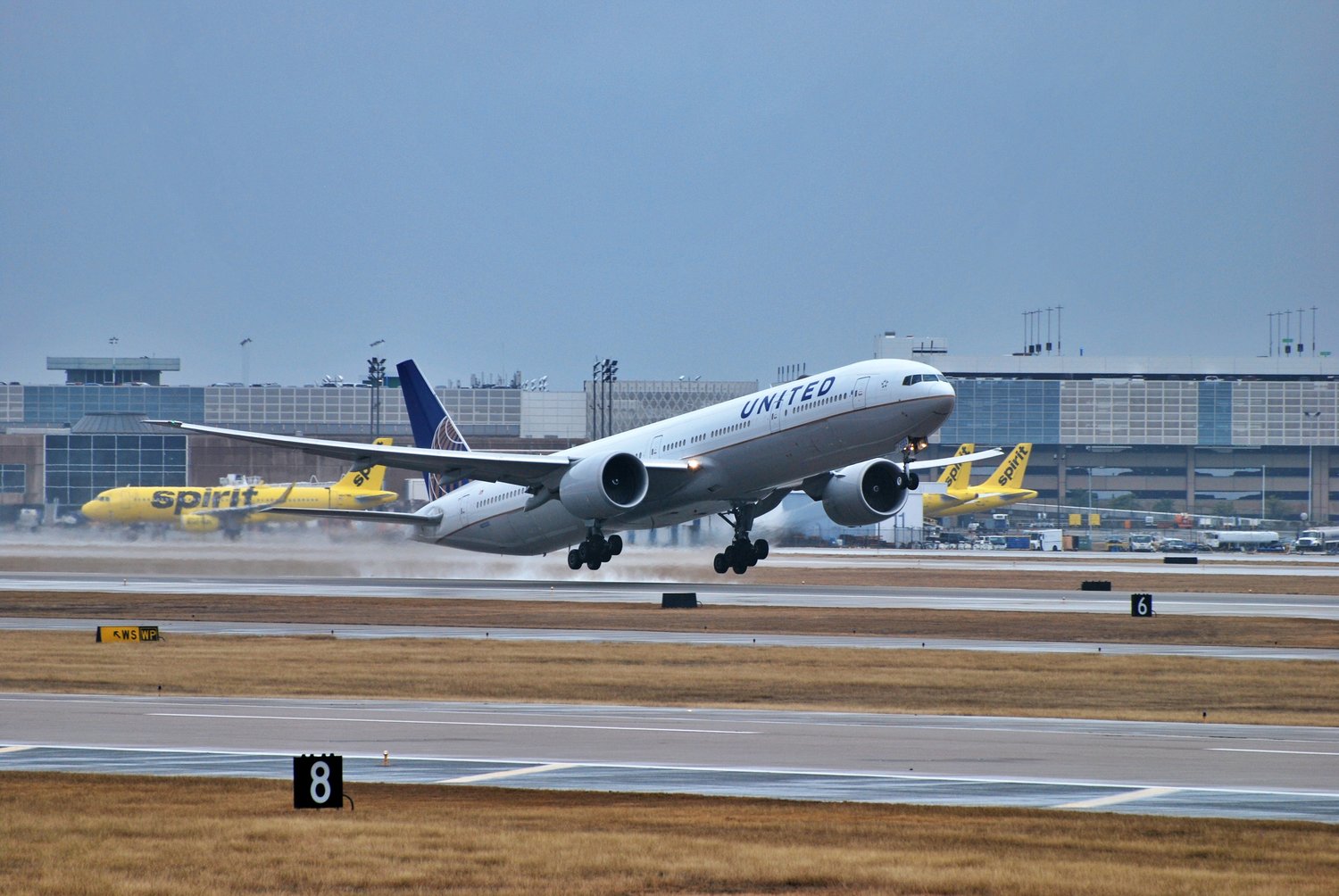 Airplane taking off from airport runway