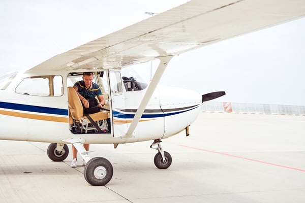 Student pilot doing a preflight at flight school