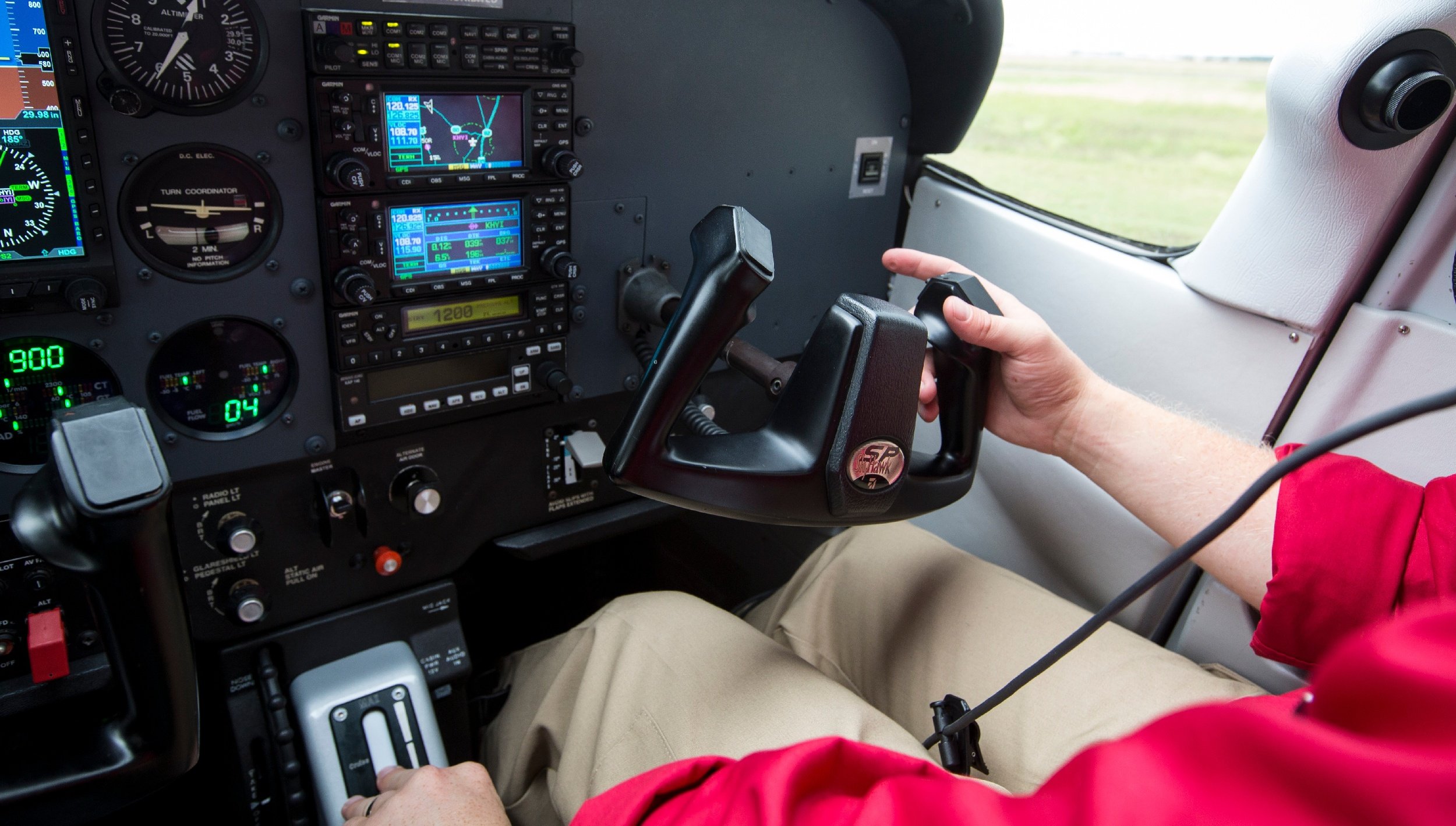 Pilot at the Controls of an Airplane