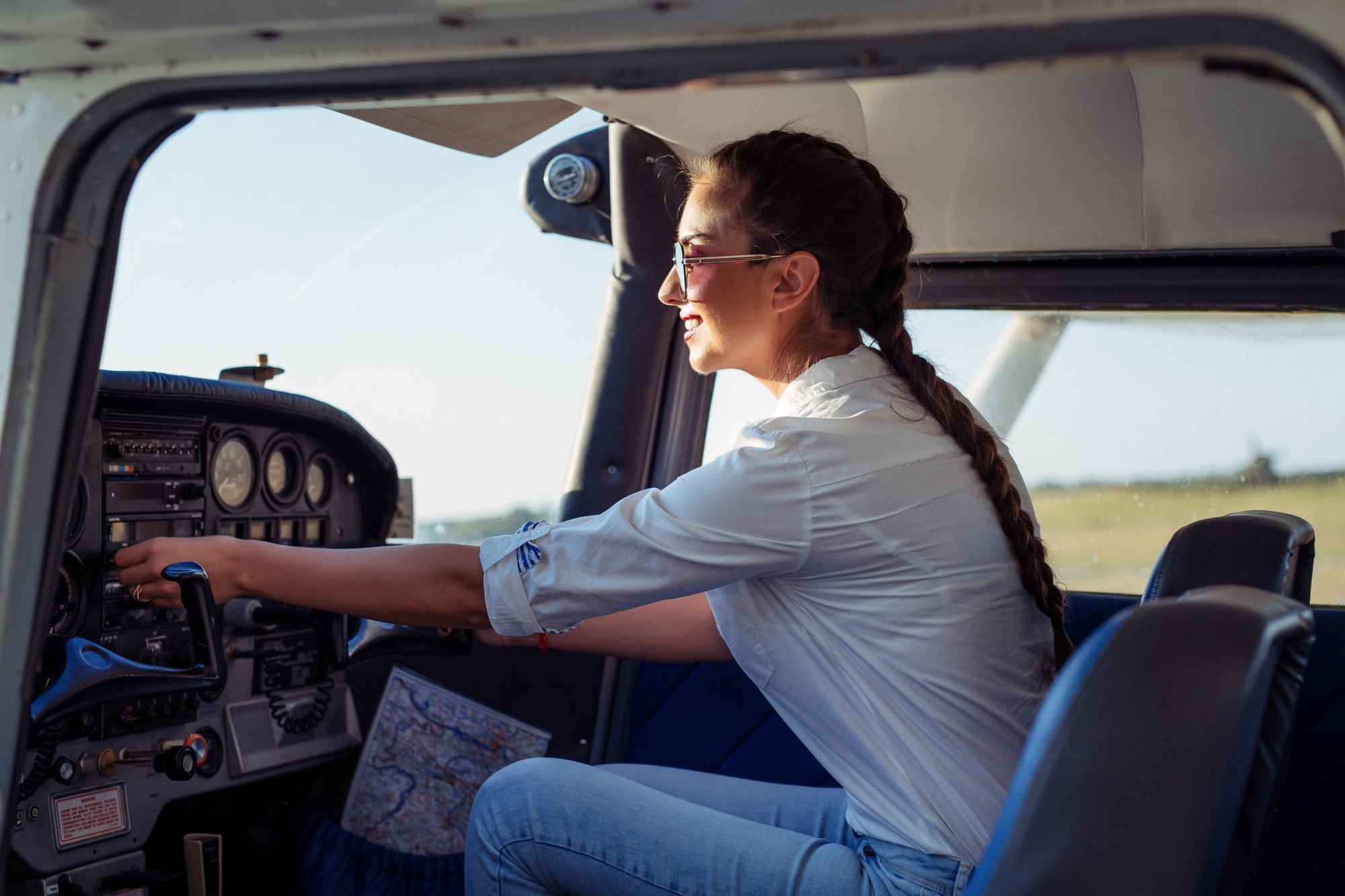 Pilot in her airplane on the ramp