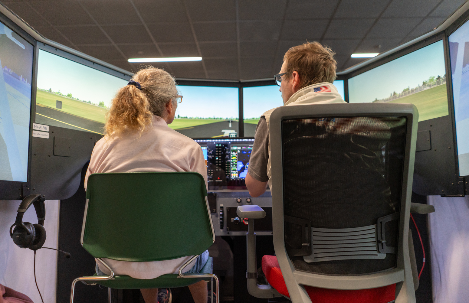 Learner and flight instructor training on a Redbird LD