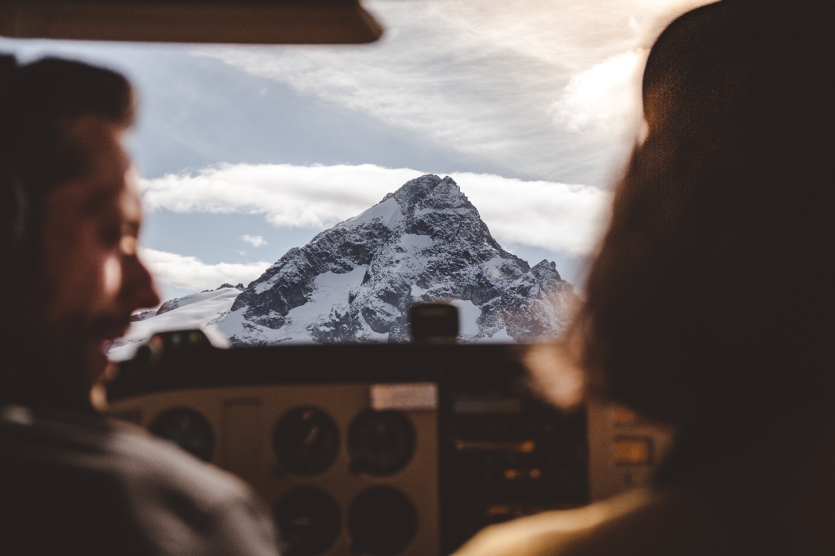 Pilots Talking While Mountain Flying