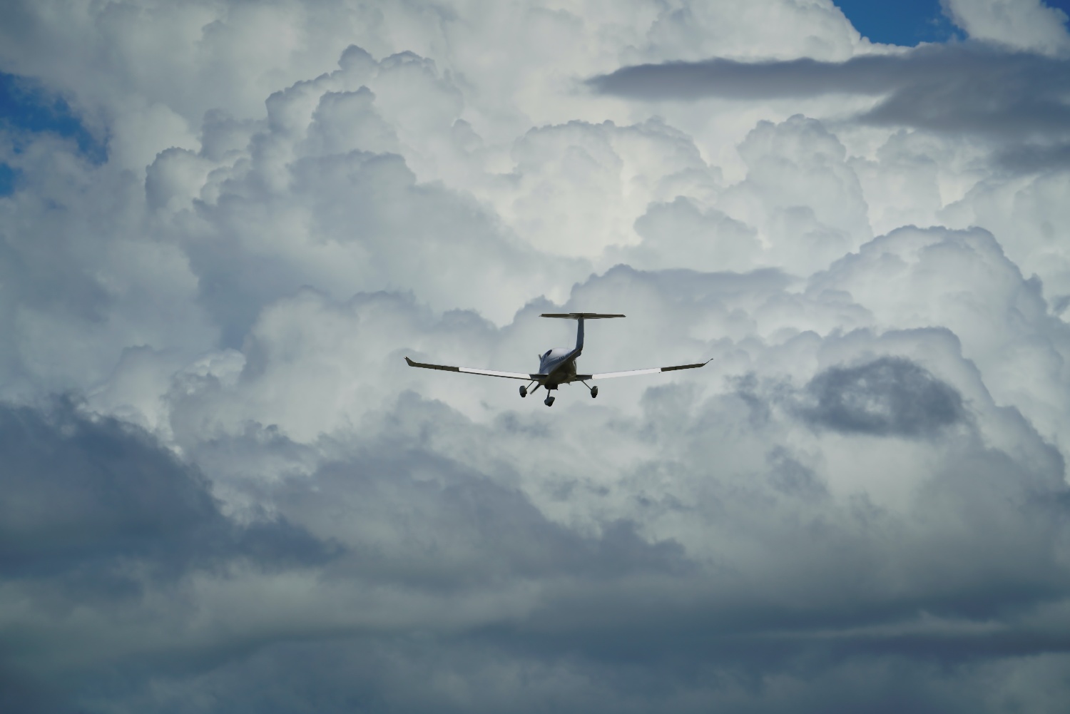 Airplane departing in cloudy conditions